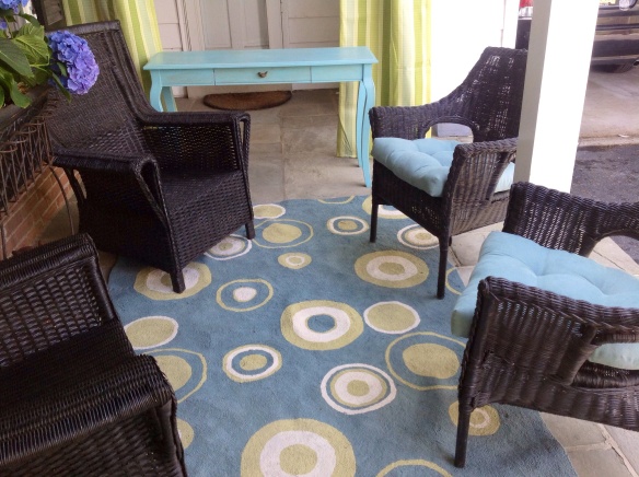 Adding to the 2 existing black wicker chairs from Pier I, I spray painted 2 thrift shop finds in black Krylon paint. Although not matching, the 4 chairs work together